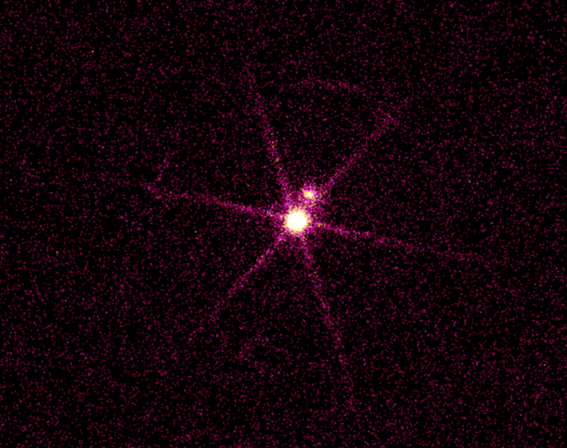 Chandra X-ray image of the Sirius system, a bright central point source with a six-spoke diffraction pattern and a dimmer companion.